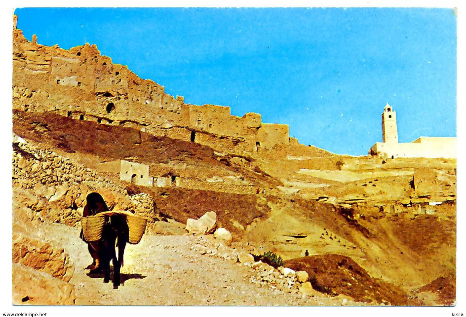 CPSM 10.5 X 15 Tunisie  CHENINI -TATAHOUINE   La Mosquée  Village Troglodyte  Femme âne - Tunisia