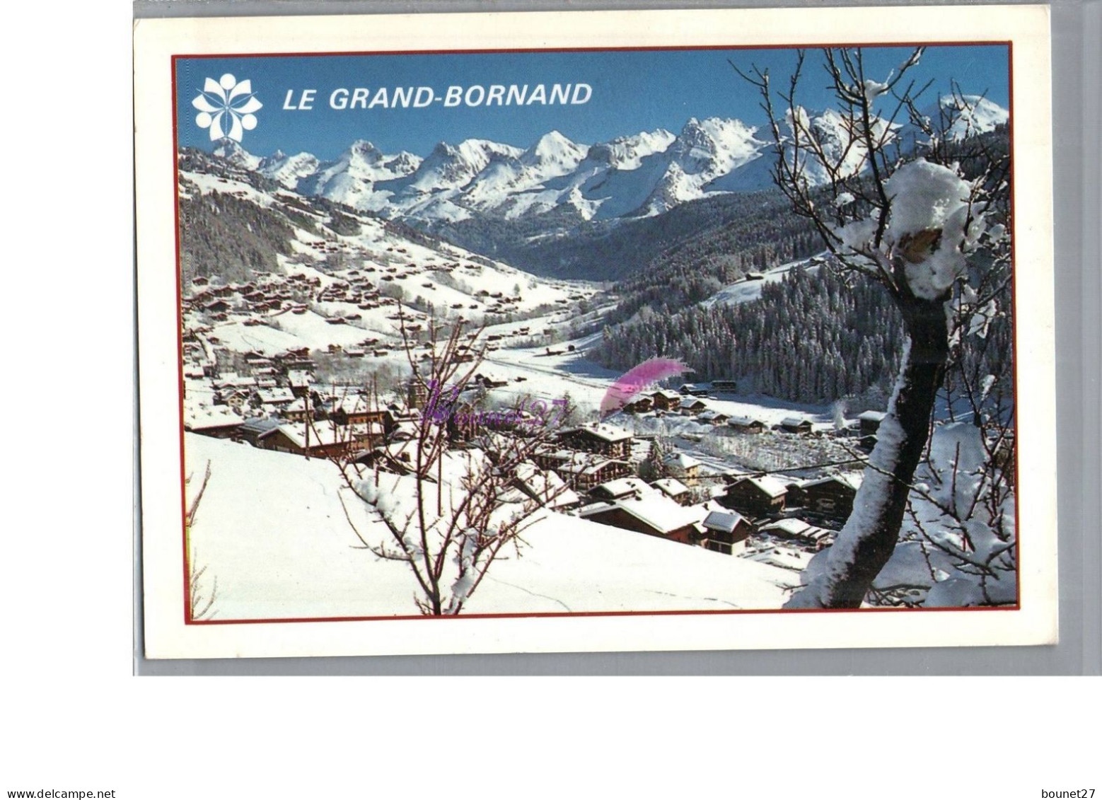 LE GRAND BORNAND 74 - Vue Générale De La Ville Station En Hiver Et La Chaine Des Aravis - Le Grand Bornand