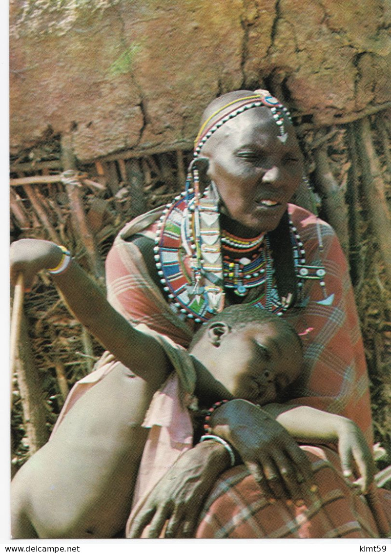 Masai Woman With Child - Tanzania