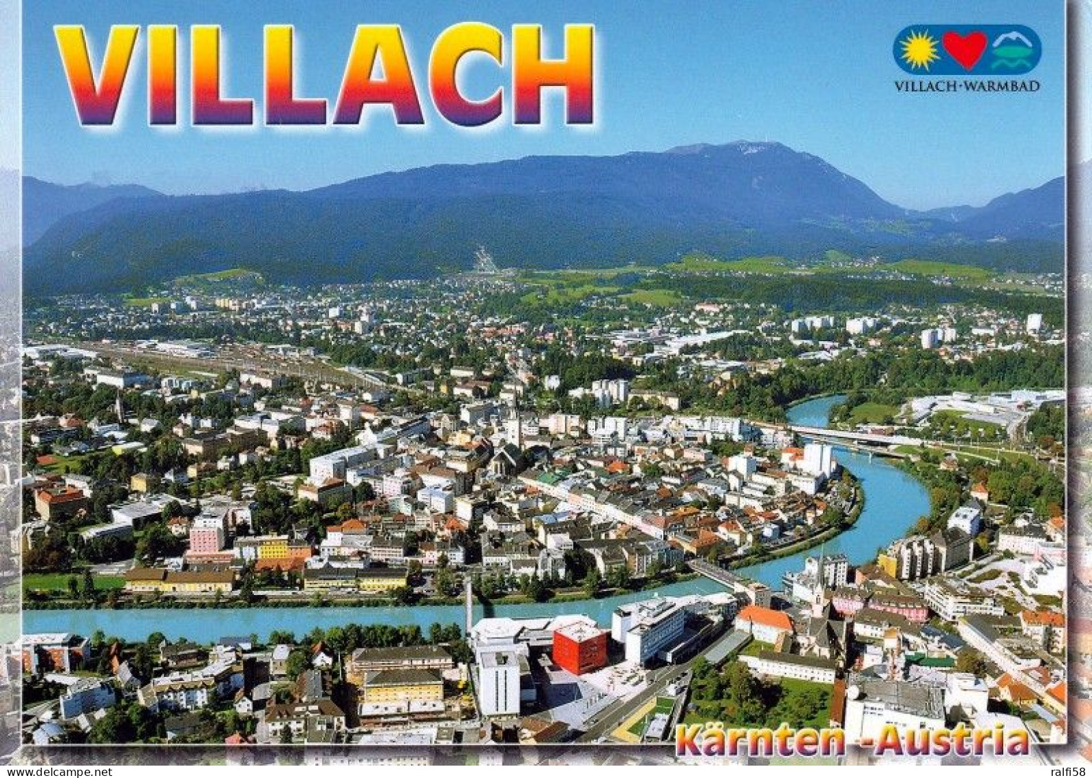 1 AK Österreich / Kärnten * Blick Auf Die Stadt Villach Gegen Dobratsch - Luftbildaufnahme * - Villach