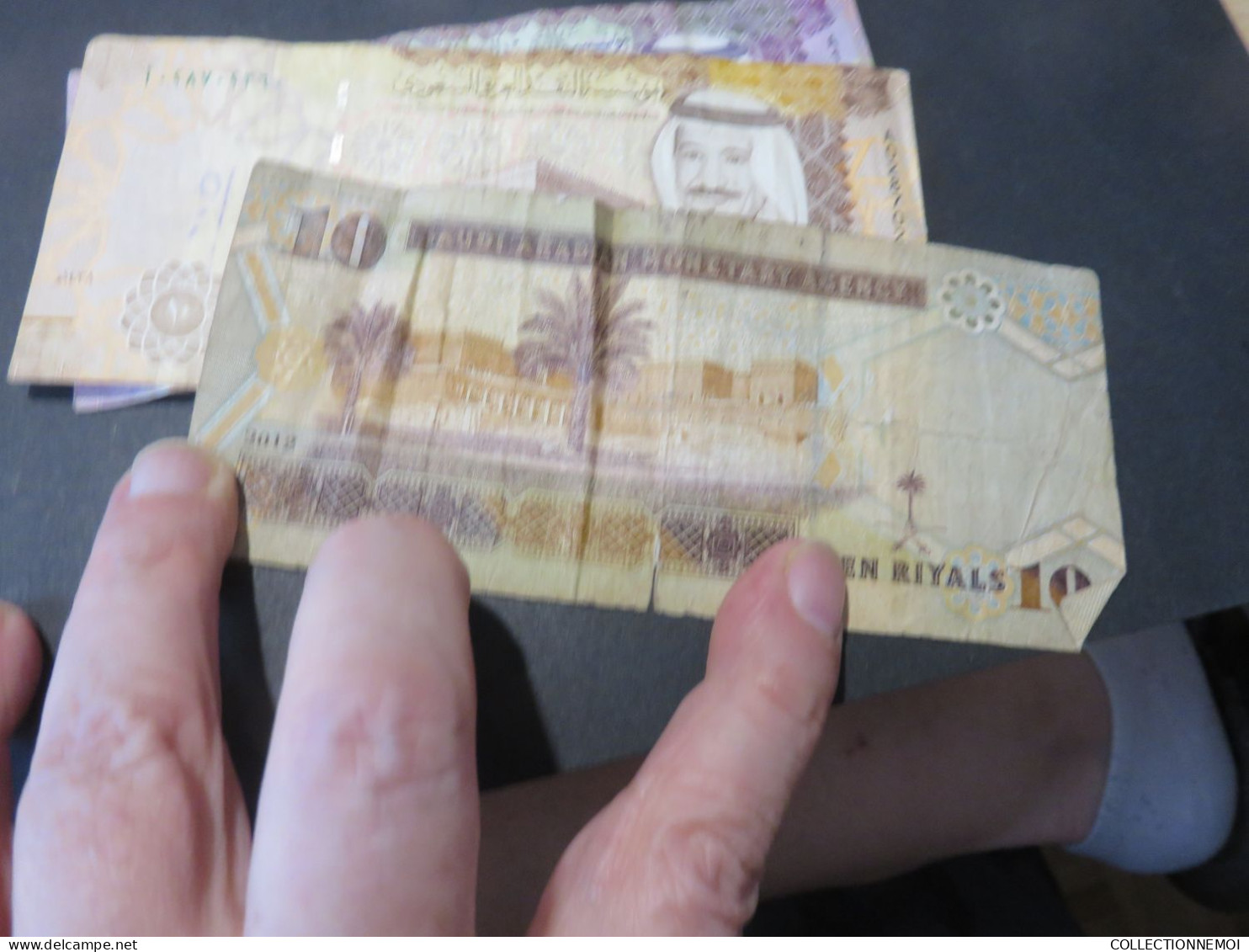 10 billets d arabie saoudite , vendue comme ils sont