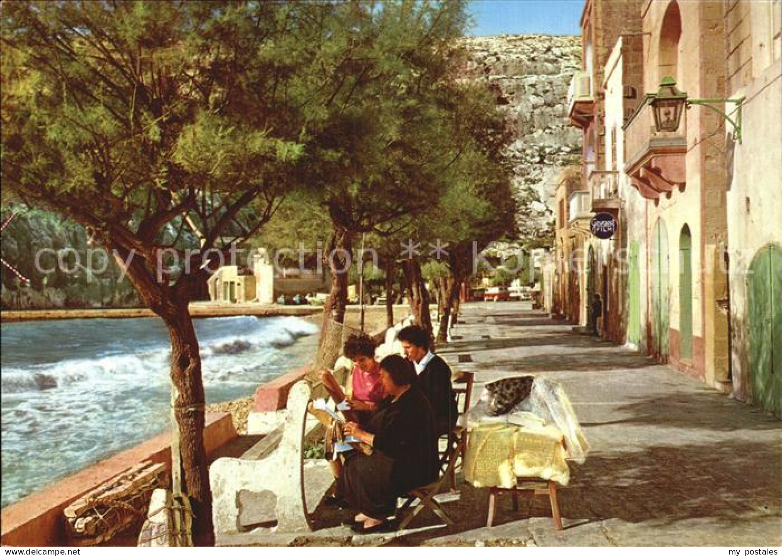 72563779 Gozo Malta Lace Working Women Xlendi Bay  Gozo Malta - Malta