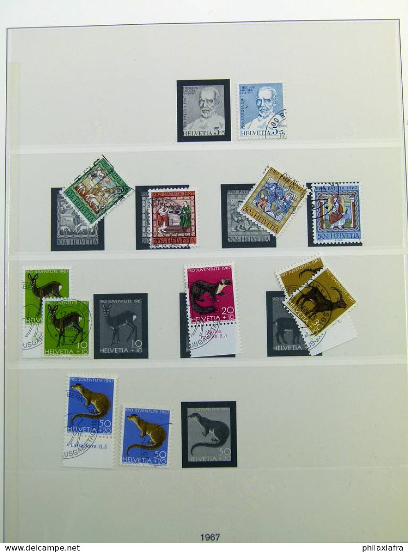 Collection Suisse, sur pages d'album, années 1960, avec timbres oblitérés.