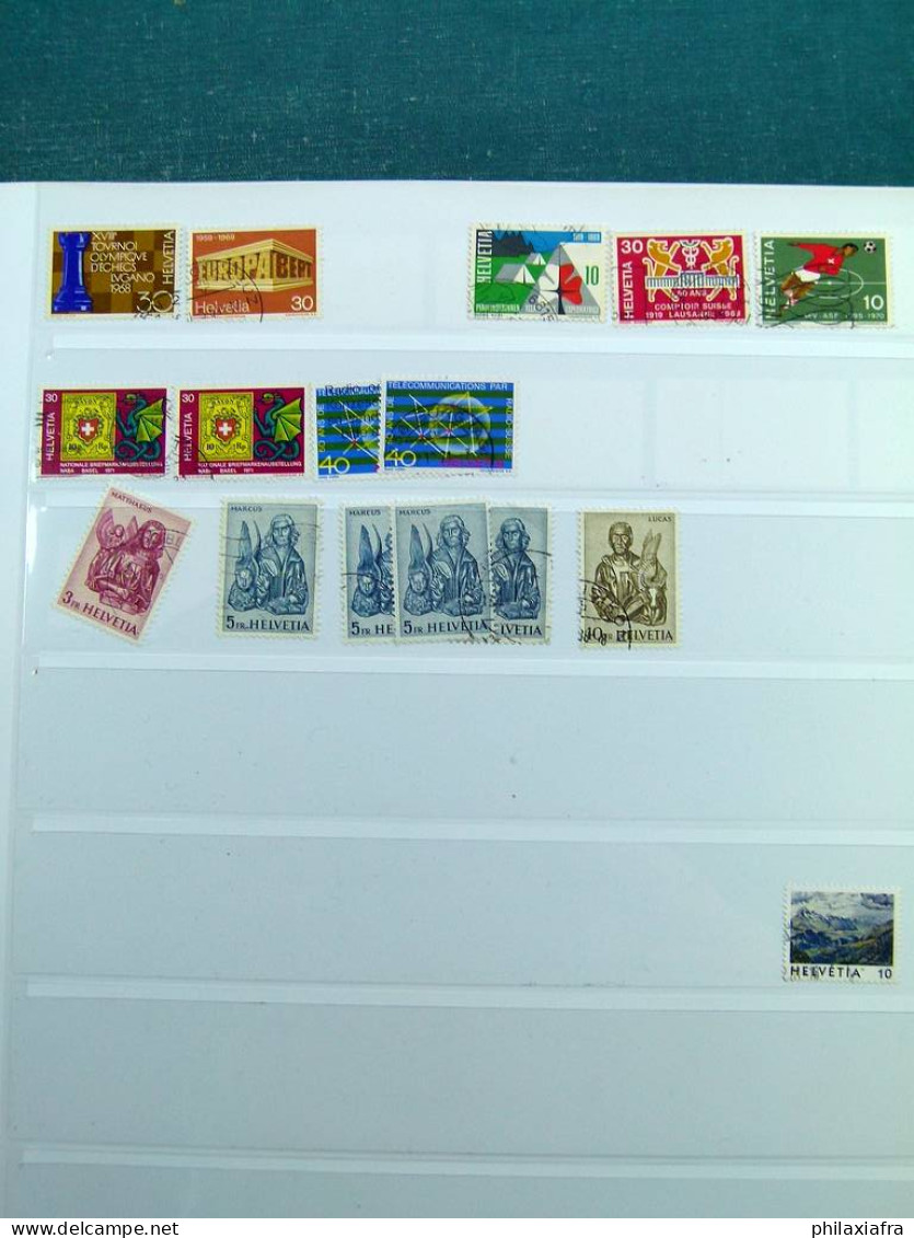 Collection Suisse, sur pages d'album, années 1960, avec timbres oblitérés.