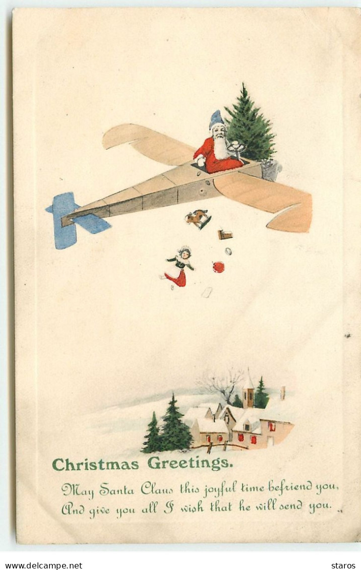 Christmas Greetings - Père Noël Dans Un Avion Lançant Des Cadeaux Au-dessus D'un Village - Autres & Non Classés