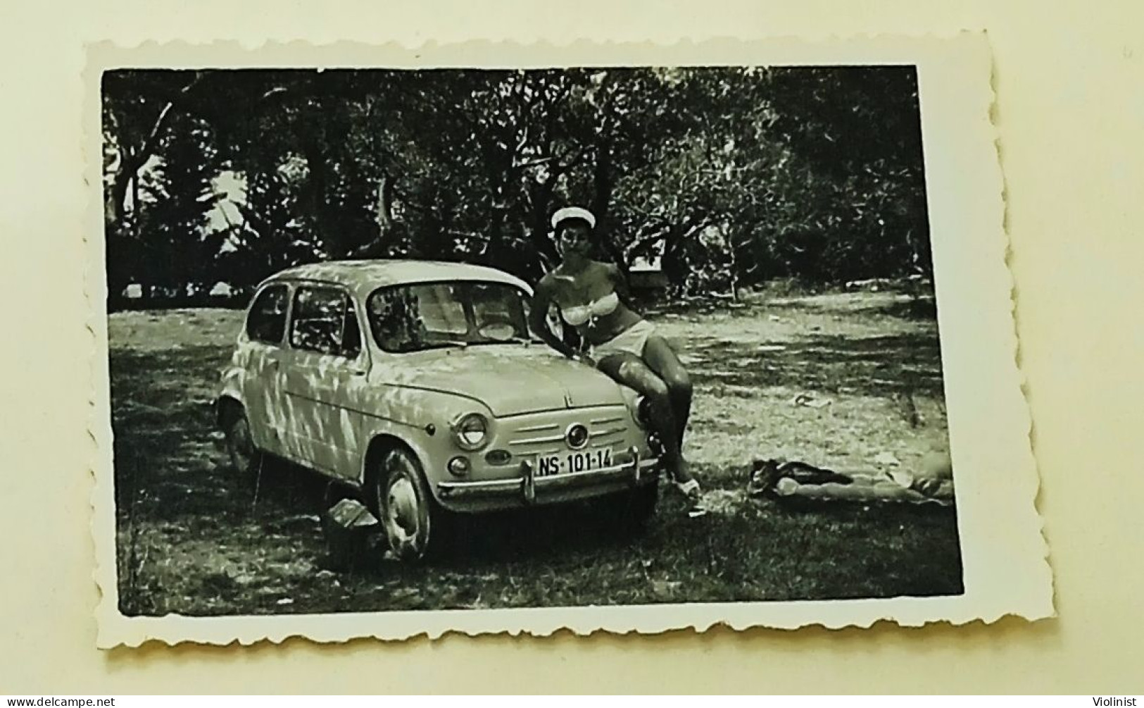 A Woman In A Bikini Poses Sitting On A Small Fiat Car - Cars