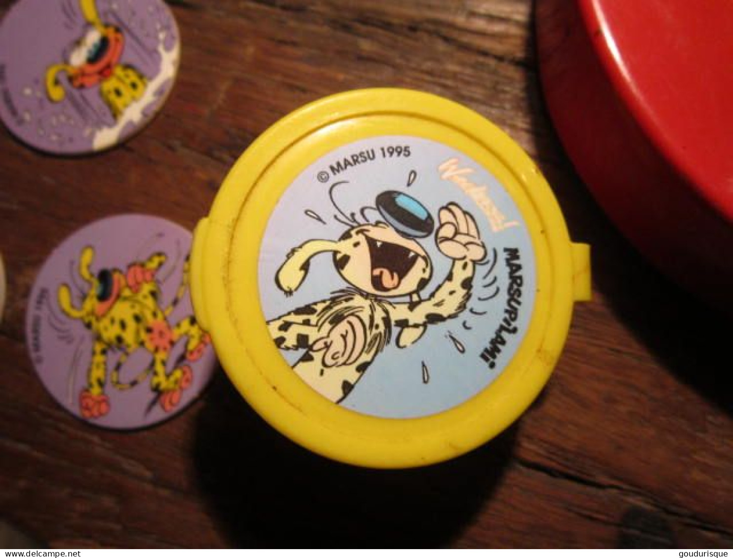 MARSUPILAMI  5 POGS ET 1 SLAMMER MARSUPILAMI  Et SON ETUI OFFERT PAR QUCIK - Marsupilami