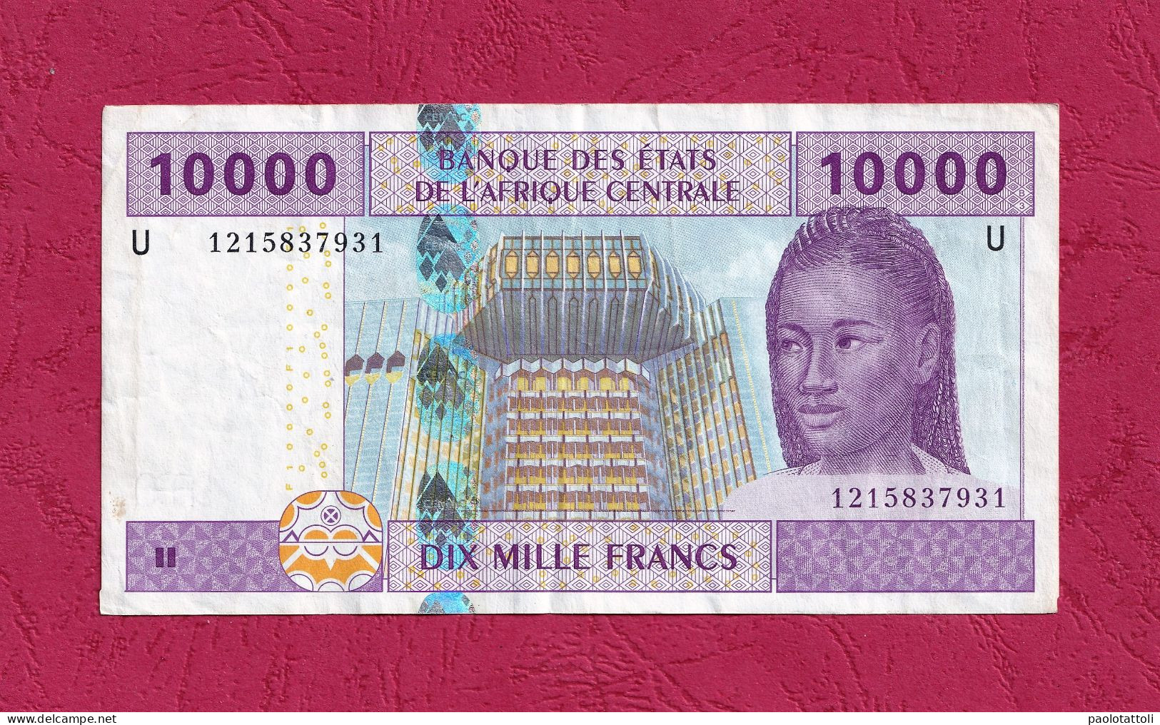 Cameroun, 2002- 10000 Francs. Obverse Portrait Of A Young Braided Woman. Reverse Transport And Communication. - Camerun