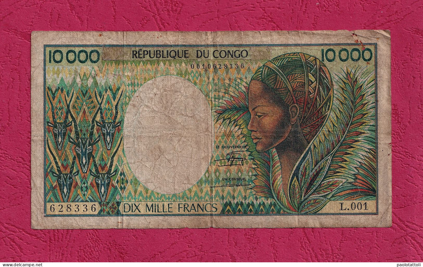 Congo,1992- 10000 Francs. Obverse Woman And Antelopes Heads. Reverse People Loading Bananas Onto Truck.  BB- VF- TTB. - Repubblica Del Congo (Congo-Brazzaville)