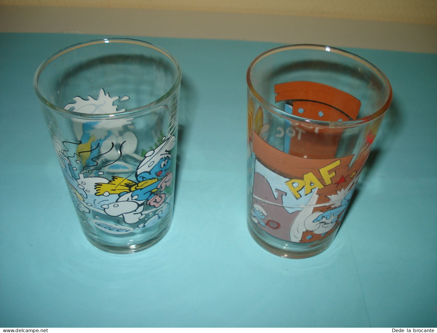 O20 ( 17 ) / Lot De 2 Verres De Collection - Schtroumpfs - Peyo - Advertisement