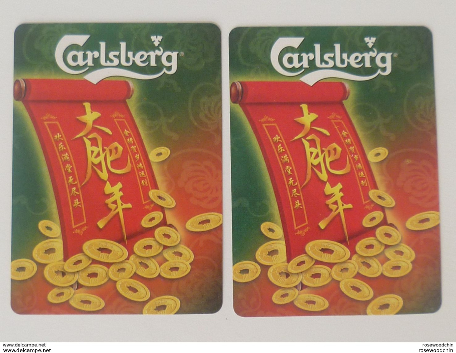 Set Of  2 Pcs. Carlsberg Beer Chinese New Year Gold Coin Playing Card Skating Joker (#72) - Cartes à Jouer Classiques