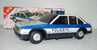 ANTIGUO COCHE POLICIA DE PAYA - MODELO VOLKSWAGEN PASSAT - DE HOJALATA LITOGRAFIADA A PILAS -. CON SU CAJA ORIGINAL - - Jouets Anciens