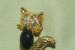 BROCHE CHAT 7 BRILLANTS YEUX Et Dessus De La Tête Et PIERRE NOIRE   32 Mm - Brooches