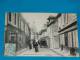 18) Dun-sur-auron - N° 1130 - La Grande Rue Et L'horloge ( Boulangerie COCHET - Attelage ) Année 1906 - EDIT - Auxenfans - Dun-sur-Auron