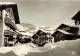 CPSM  MEGEVE Un Coin Du Village Avec La Route De Rochebrune  Et Le Mont Blanc - Megève