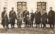 WISSOUS  CARTE PHOTO MILITAIRE  LOT DE 3. SOLDATS DU 4ME REG SUR PATTE DE COL. LES GVC ? DEVANT LA GARE.  AVRIL MAI 1915 - Autres & Non Classés