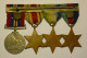 Grande-Bretagne Great Britain Lot Of 4 Medals + Miniatures : ATLANTIC STAR / AFRICA STAR / 1939 - 1945 STAR /  WAR MEDAL - Gran Bretagna
