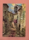 * CPM..( Dépt 06 )..EZE Village  :  Vieille Rue - Peinture De H. Barry  :  Voir Les 2 Scans - Paintings