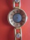 Montre De Publicitaire DAXON  à Réparer Vendu En L'état &gt; Voir Les Dephotos - Advertisement Watches