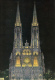 5761- VIENNA- THE  VOTIV CHURCH BY NIGHT, POSTCARD - Églises