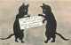 232149-Halloween, F.A. Owen No 853, Black Cats Standing On Hind Legs Holding White Sign With Message - Halloween