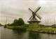 JOURE (Friesland) - Molen/moulin - Mooie Opname Van De Groene Molen Opgezeild En In Werking, Gezien Vanaf Het Water - Joure