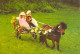 ENFANT  Kütschlein (Enfants Chariot Cheval Robe Fleurs )(d´après Photo U.Fäsch )(Cpm 17 X 12 Cms-Wizard & Genius 9262) - Autres & Non Classés