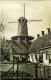 GOUDA (Zuid-Holland) - Molen/moulin - Stellingmolen De Roode Leeuw Omstreeks 1930 Met Het Verdwenen Roomsche Hofje - Gouda