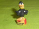 Fèves / Dessins Animés / WB :canard , Daffy Duck,fait La Danse Du Canard  " Mat "       T104 - Dessins Animés