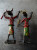 SCULPTURE - AFRIQUE - PAIRE DE PERSONNAGES - MUSICIENS ? SORCIERS ? - METAL - PEINTURE - H:165 Mm - African Art