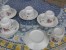 Delcampe - Série De 5 Tasses à Café + Soucoupe,crémier , Sucrier Ancienne Porcelaine Début 1900 Décor De Fleurs ,oiseaux & Dorures - Tasses