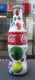 AC - COCA COLA 2014 SHRINK WRAPPED EMPTY GLASS BOTTLE & CROWN CAP DESIGNED BY ARZU KAPROL - Bottles