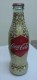 AC - COCA COLA - SHRINK WRAPPED EMPTY GLASS BOTTLE 2010 - Bouteilles