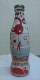 AC - COCA COLA - POLAR BEAR ILLUSTRATED SHRINK WRAPPED EMPTY GLASS BOTTLE - Bottiglie