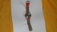 MONTRE USAGEE DOMI A AIGUILLE. DATE ?.  BRACELET ROUGE. - Montres Modernes