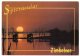 ZIMBABWE - ELEPHANT SILHOUETTED AGAINST THE SETTING SUN ON LAKE KARIBA / THEMATIC STAMPS-AIRPLANE - Zimbabwe