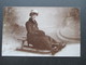 AK / Echtfoto 1910 Frau Auf Einem Schlitten. Charlottenbrünn Schlesien. Interessante Karte - Schlesien