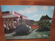 Key West's Conch Tour.....Here The Train Picks Up Passengers At The Gingerbread Station On Duval Street - Key West & The Keys