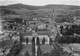 71-CLUNY- VUE AERIENNE SUR L'ABBAYE - ECOLES DES ARTS- AU FOND LA MONTEE DU LOUP - Cluny