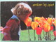 Poland 1999 Postcard ""kid Or Girl Smelling Tulip Flowers"" Katowice To England - Pinecones Pinus - Zodiac Taurus - Coun - Poland