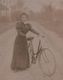 Delcampe - Photographie Montée Sur Carton  / Femme Posant Avec Sa Bicyclette /Rachel FASQUEL/ Vers 1880-1900     PHOTN336 - Anciennes (Av. 1900)