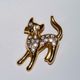 BROCHE Doré CHAT STRASS TBE COMME NEUVE - Broches