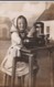 AQ74 - RPPC - Young Girl Weaving - Photographs