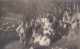 Austria(?), Group Of Men And Women, One Man Dressed As Monk, Pose Above Town, C1920s Vintage Real Photo Postcard - Other & Unclassified