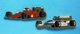 Delcampe - 2 PIN'S //   ** F1 FERRARI F1-90  MARLBORO ** . (Locomobile) ** F1 LIGIER JS37  RENAULT  GITANES BLONDES ** . (Winner) - F1