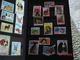 Delcampe - PETIT ALBUM RENFERMANT UNE COLLECTION DE TIMBRES SUR LES CHIENS - Collections (en Albums)