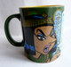 MUG TASSE EN FAIENCE VERT PARC ASTERIX 2010 CLEOPATRE ET ASTERIX - El Arte De La Mesa