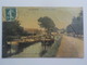 1900  CP Colorisée La Bassée Le Canal D' Aire Péniches Edit: épicerie, Mercerie, Tabac - Autres & Non Classés