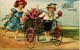 13190  -   Bonne Année - ENFANTS  AU CHARIOT DE FLEURS   En Relief - Gaufrée - Embossed - Prage - Circulée En 1907 - Autres & Non Classés