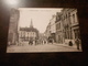 CPA ANIMEE - ARMENTIERES - RUE DE DUNKERQUE - COMMERCES - Mercanti